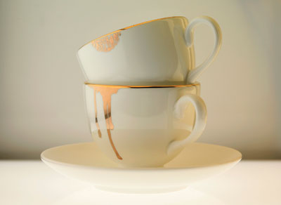 Reiko Kaneko's Lip Tease and Drip Tease teacups, 4 in. (11 cm) in length each with handle, 24k gold on fine bone china.