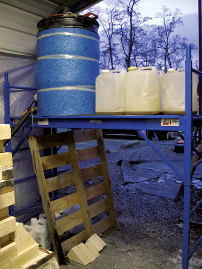 Shippensburg University's drip feed system for Waste Vegetable Oil (WVO) is fed by a barrel placed several feet above the burner height to allow for a gravity feed.