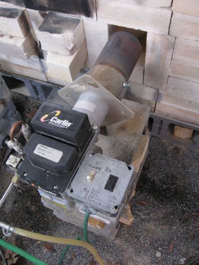 The recuperative chimney on one of Shippensburg University's kilns reclaims heat from the exterior of the chimney and the warm air is used with the drip plate burner system to enhance fuel combustion