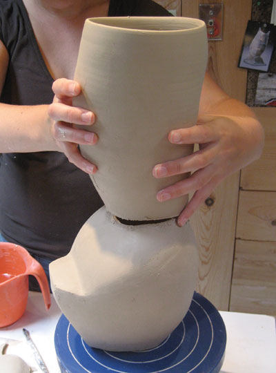 13. Slip and score the pitcher neck onto the bottom. Reach inside and press up into the top to compress the seam.