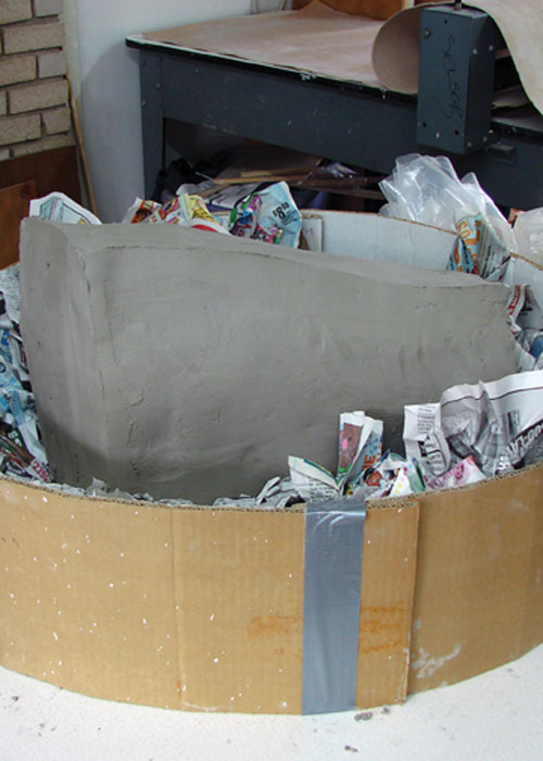 Fig.7 For complex shapes, rest the form in a nest of crumpled newspaper.