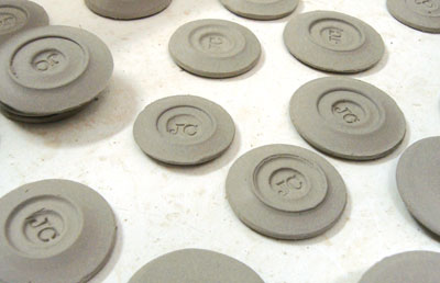 Fig.9 A stockpile of various bottom discs with differing diameters.