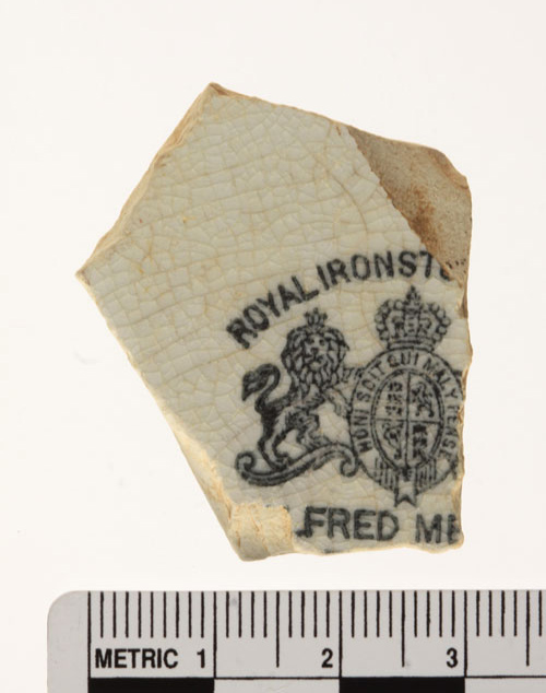 Fragment of historic ironstone china featuring a maker's mark, which can be used to date this artifact. This artifact was recovered from a U.S. Army Corps of Engineers property in Indiana.