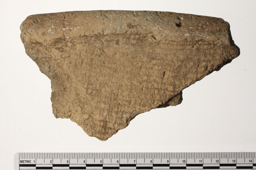 Prehistoric pottery sherd, dating to the Woodland Period (1000 BCE-CE 900), features a folded rim and fabric impressions. Veterans working as archaeological laboratory technicians take forensic-level digital photographs of interesting artifacts that are diagnostic of specific time periods.