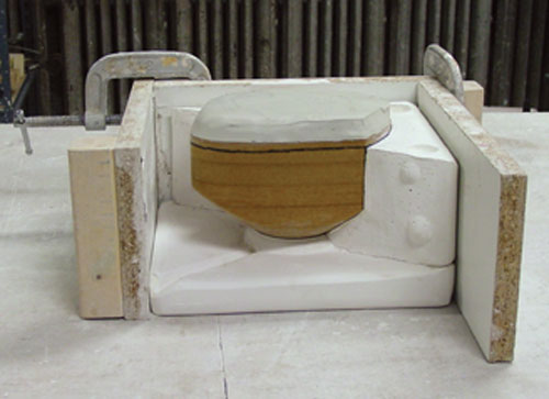 Fig.4 Add a clay slab to the sealed prototype to create a pouring gate or slip reservoir.