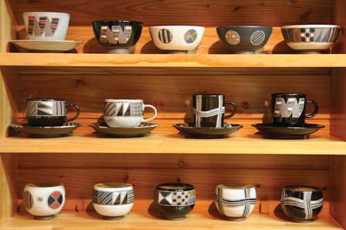 Inlaid geometric slip and glaze designs give Fuyima Mukoyama's pottery individual character.