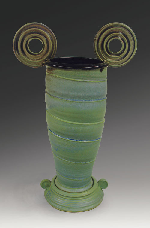 Disk Vase with Blue/Green/Purple variation of VC glaze with PV Black sprayed on top.