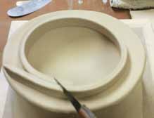 11 Cut a strip of clay for the flange, trim it at an angle, and join the two ends.