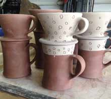 6 Once the mugs and the filter cones are leather hard, put the set together to dry. Bisque fire the set together.