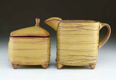 Twiggy Cream and Sugar, mid-range red stoneware, gold glaze.