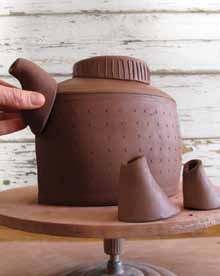 9 Try the spouts on for size and look and choose the best one for each teapot.