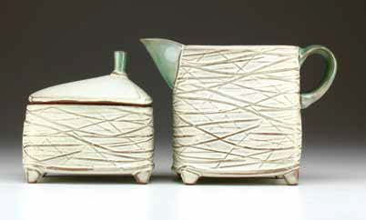 Twiggy Cream and Sugar, mid-range red stoneware, with bone and teal glazes.
