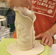8 Create an undulating rim, press out the leaf texture, and add a slab base.