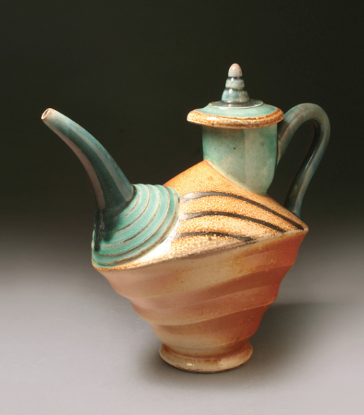 Striped Teapot, 12 in. (30 cm) in length, thrown and altered white stoneware, soda fired to cone 10. Photo: Lucy Breslin.