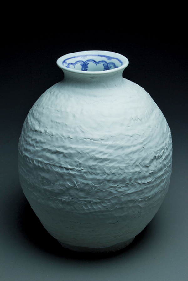 7 Wansoo Kim’s Reversal, 13 in. (33 cm) in height, porcelain, painted cobalt and feldspar glaze, fired to cone 10 in reduction, 2014.