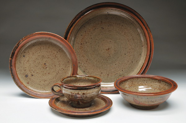 6 Dinnerware set, to 10½ in. (27 cm) in diameter, wheel-thrown stoneware, 1962. Made for Glick’s thesis exhibition at Cranbrook Academy of Art.