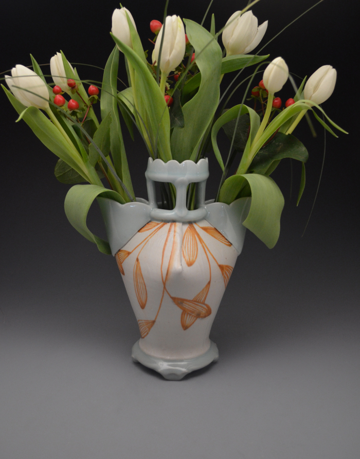 Once you’ve mastered throwing a classic bottle form, there are all sorts of possibilities for expression, such as this thrown and altered tulip vase by Jen Allen.