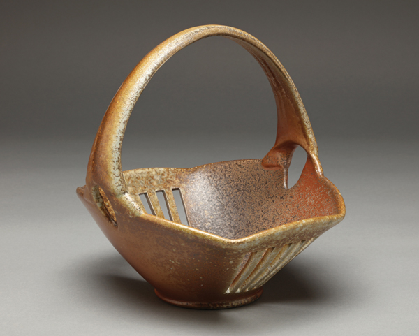 Tara Wilson's basket, 2015, 12 inches in height, thrown and altered stoneware, woodfired to cone 10. Photo: Tom Farris