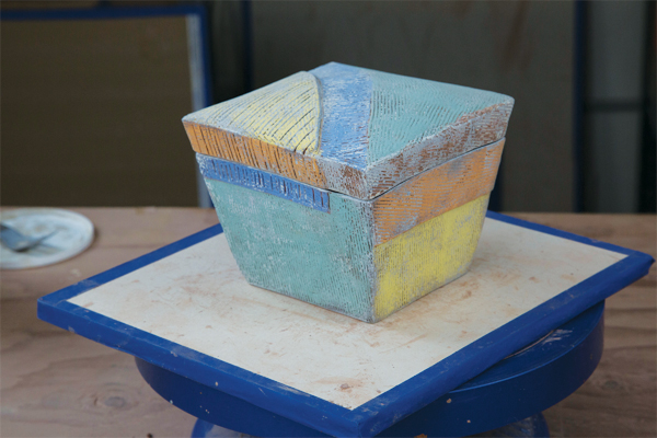 24 Sandblast the exterior of the box to muddle the surface and reveal a bit of the color under the terra sigillata.