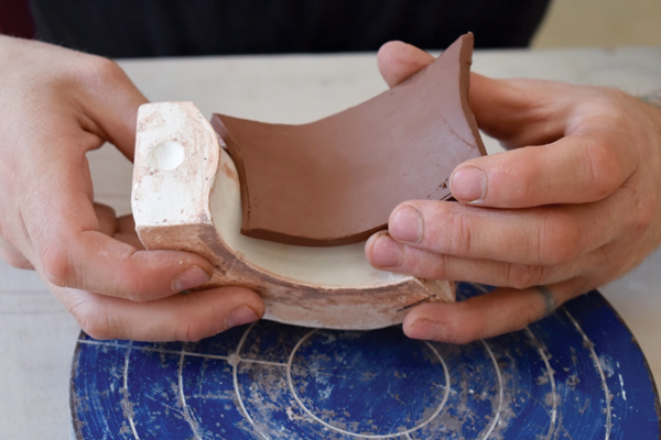 2 Press the cut slabs into their corresponding mold pieces