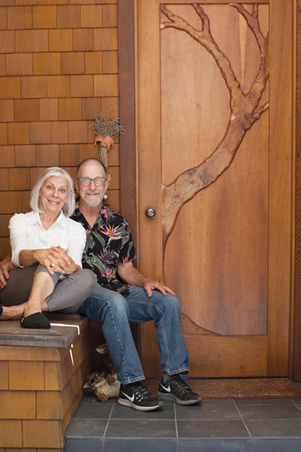 1 Claudia Tarantino and Bill Abright by the front door they designed, built by Michael Boch. Photo: Michael Fahey.