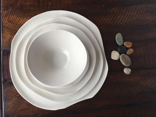 1 This Quiet Dust Dinnerware Collection, 13½ in. (34 cm) in diameter, glaze, fired to cone 6 in oxidation.