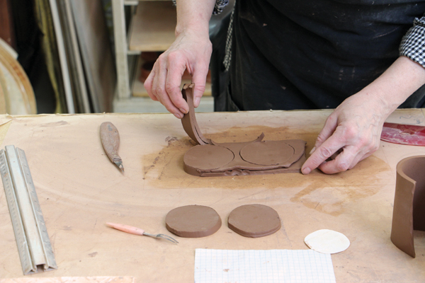 11 Cut out circles for the tops using a template. Use the same template and the two-layered slab technique to make the bases.