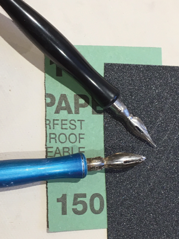 1 Use silicon-carbide sandpaper to reshape a calligraphy nib. 