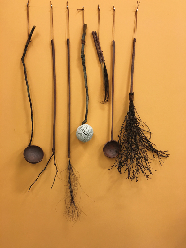 5 Mariya Gazumyan’s (Useless) Tools of Attachment, 24 in. (61 cm) in height, mixed media, stoneware, fired to cone 10, wood, hair from the artist’s daughter, 2016.