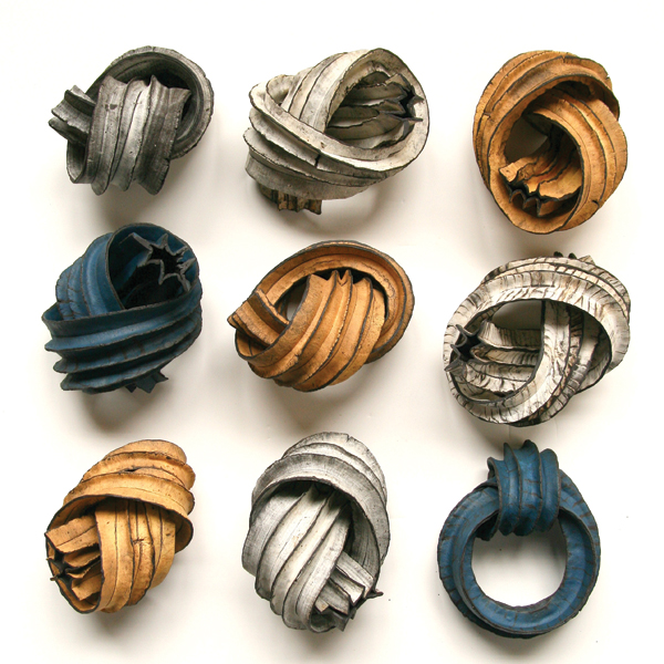 Judit Varga’s Knots, to 6 in. (15 cm) in height each, colored clay, vitreous slips, fired to cone 6 in oxidation, 2017.
