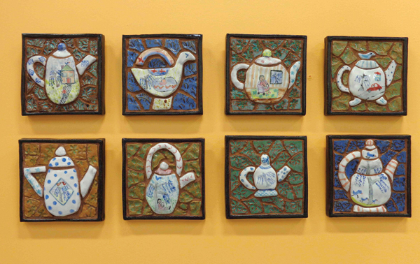 3 Laurie Rubin’s These are not teapots!, each 5 in. (13 cm) in height, mosaic, terra cotta, fired to cone 05, 2016. 