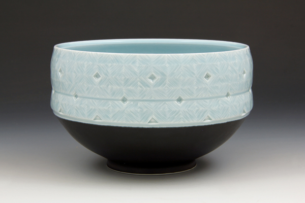 6 Small serving bowl with carved foot, 7 in. (18 cm) in diameter, porcelain, blue celadon and satin black glazes, fired to cone 10 in reduction, 2017.