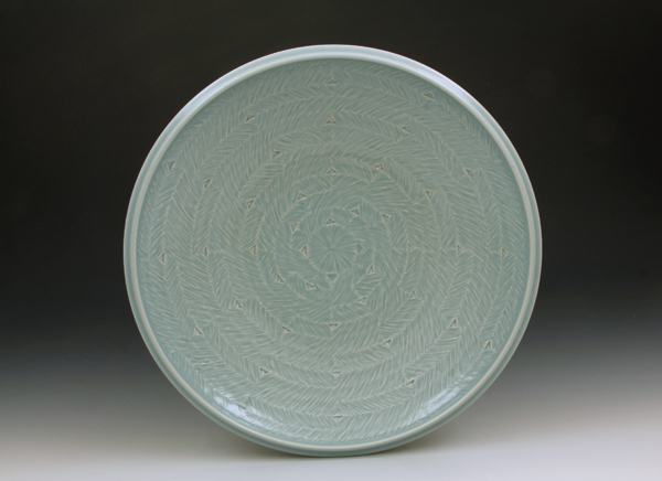 5 Serving plate, 13 in. (33 cm) in diameter, porcelain, blue celadon glaze, fired to cone 10 in reduction, 2017.