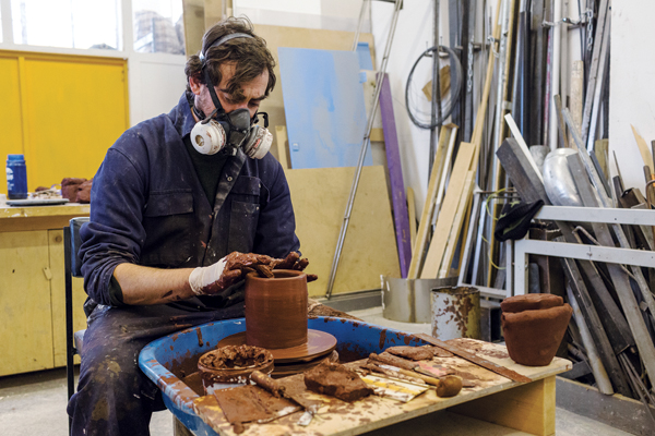 12 Toby Smith and Unknown Fields Division, creating a Ming vase form, toxic clay (film still).