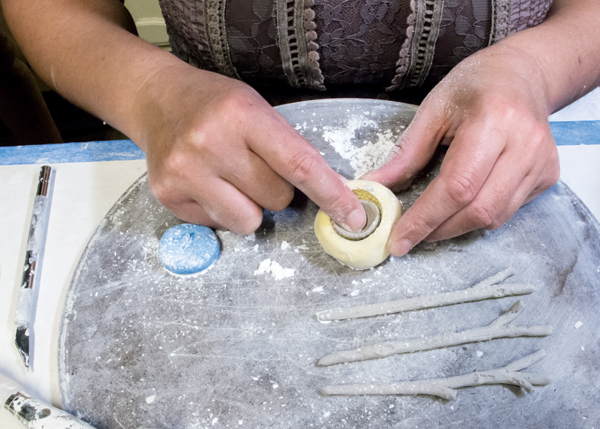 14 Form the bowl of the spoon in a mold. A light brushing of corn starch will prevent the clay from sticking to the mold.