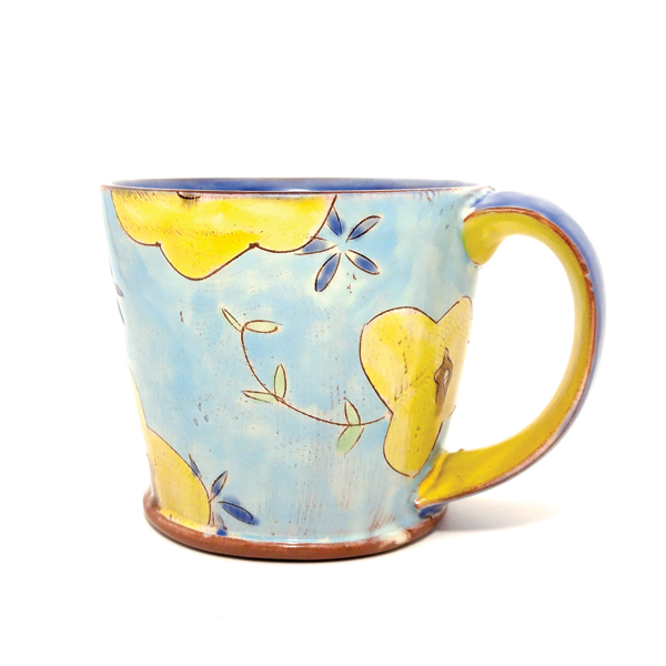 1 Kaitlyn Brennan’s Blue Floral Mug, 5½ in. (14 cm) in width, earthenware, fired to cone 04 in an electric kiln.