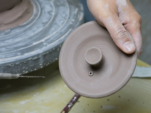 13 Add a small ball of clay when you create an air hole on the lid, to prevent the glaze from clogging up the hole during the firing.