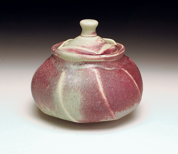 8 Faceted jar, 6 in. (15 cm) in diameter, gas-fired porcelain, reduction glazes.