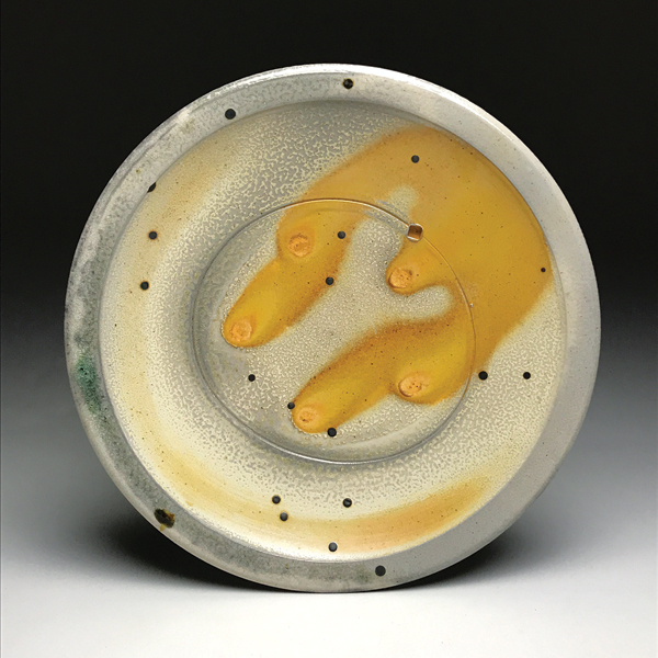 2 Tim Sherman’s platter, 16 in. (41 cm) in diameter, wheel-thrown porcelain, buckshot, wood and soda fired.