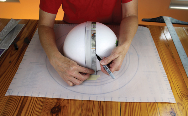 1 Tape down the template along the center of the form and draw lines along each side of the template.