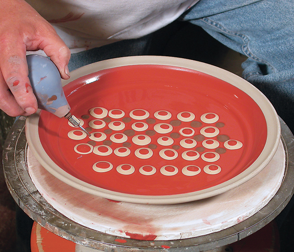 5 Dotting multi-colored liquid slips using a slip trailer.