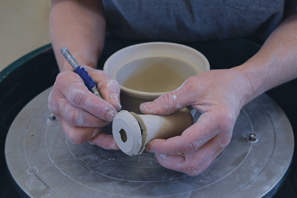 7 Cut the base off of the handle and bevel it slightly to fit the curve of the bowl.