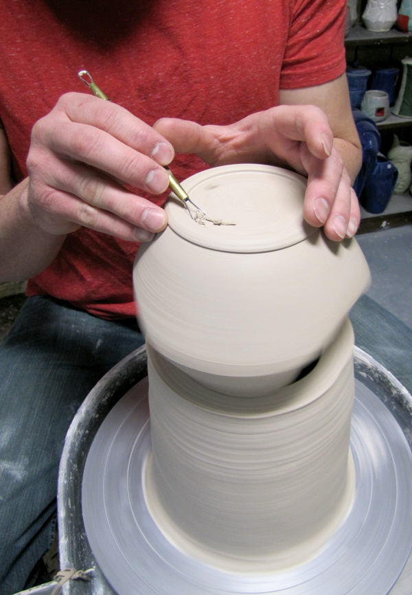 5 Throw a tall chuck to accommodate the form, then trim a foot ring.