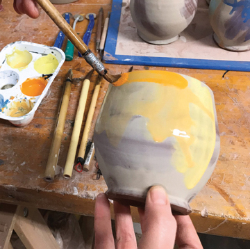 5 Layer the underglaze in washes, much like using watercolors on paper. Allow the underglaze to run and drip.
