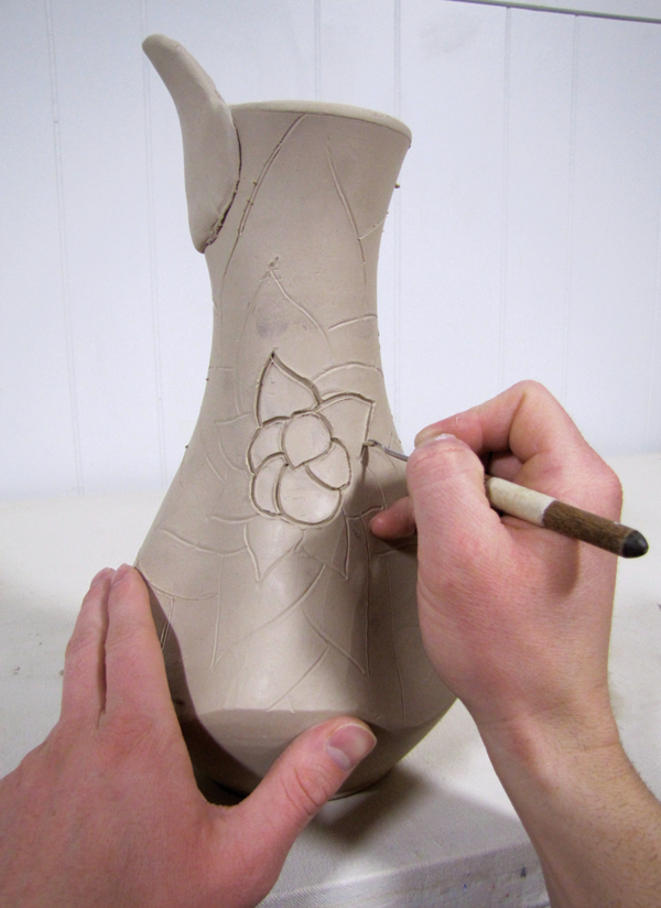 11 Use a Kemper carving tool to deepen the traced lines.
