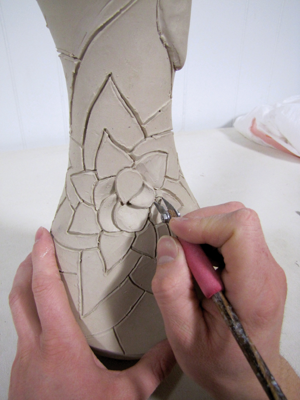 12 Bevel the outlines with the Kemper tool, then carve the petals with a Zebra tool.