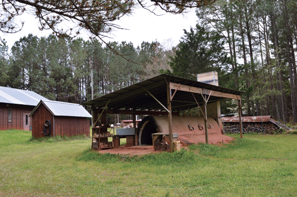 Pickett’s anagama kiln with the pottery on the left.