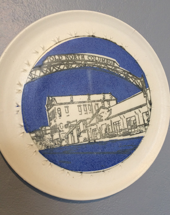 2 Detail of plate titled Old North Columbus. 1, 2 Photos: Kaitlynne Phillips.