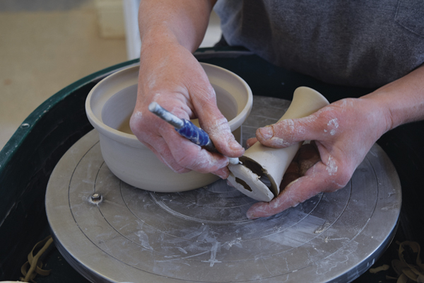 10 Cut off the base of the thrown handle, shape the cut edge to fit the baker, and bevel the cut edge.