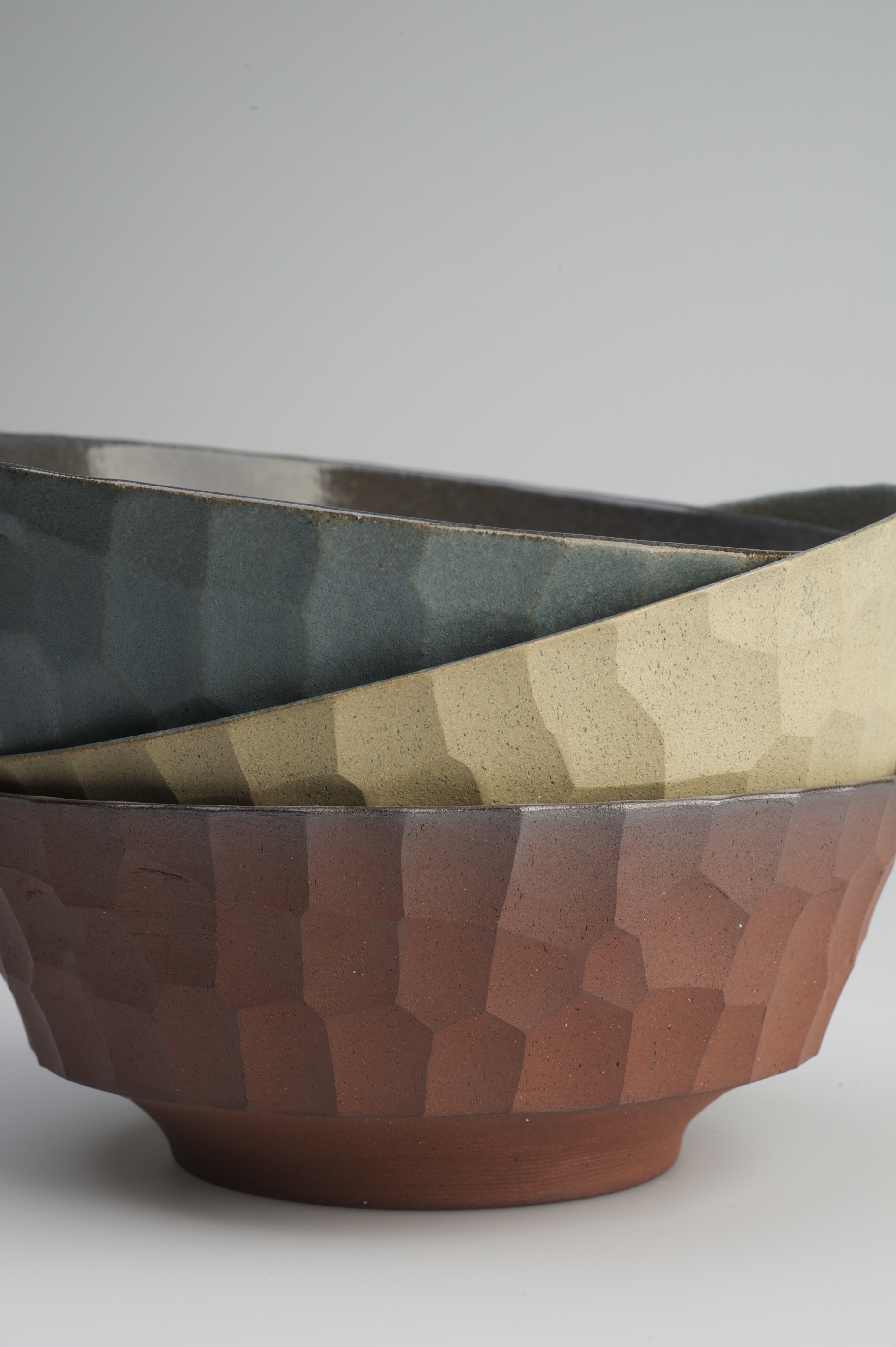 2 Bowls, to 6¾ in. (17 cm) in diameter, hand-textured stoneware, hand-textured terra cotta, glaze. Photo: Catherine Dineley.